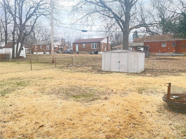 view of yard with a storage shed