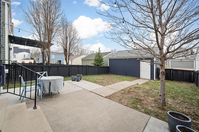 view of patio / terrace featuring a storage unit