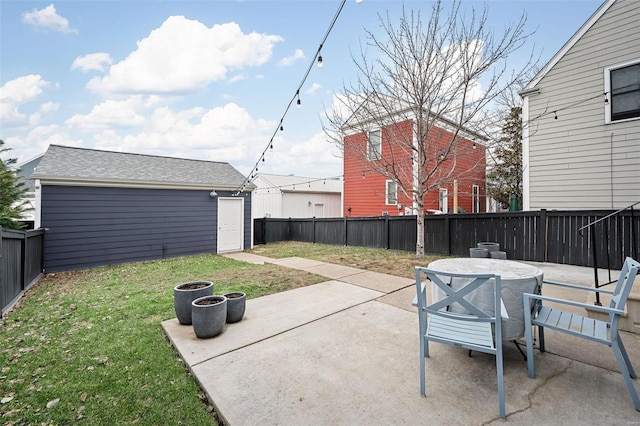 view of patio featuring an outdoor structure