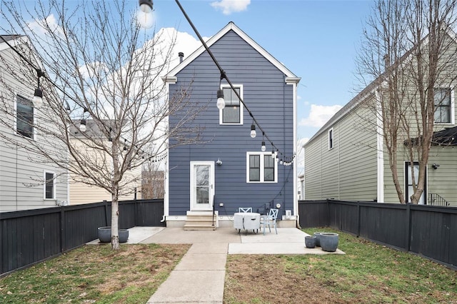 rear view of house featuring a patio area