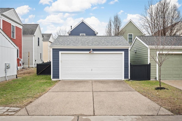 garage featuring a yard