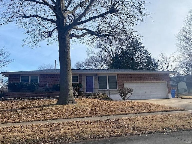 single story home with a garage