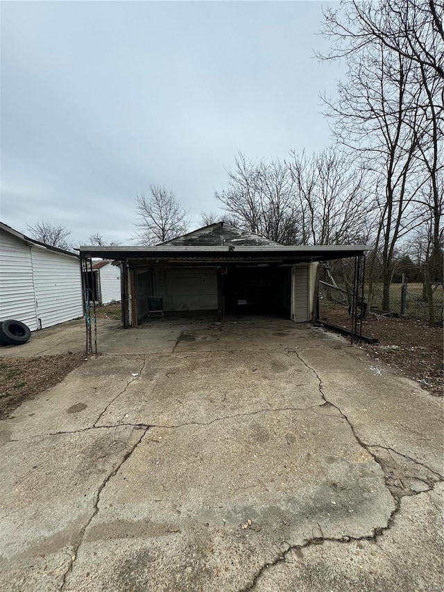 exterior space with a carport