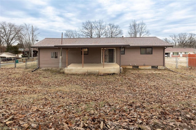 rear view of house featuring a patio