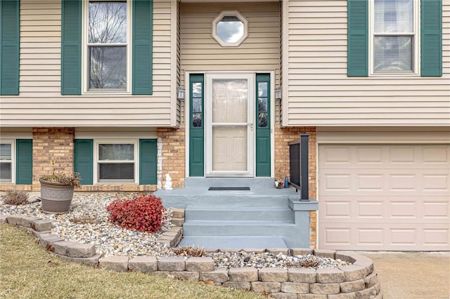 property entrance with a garage