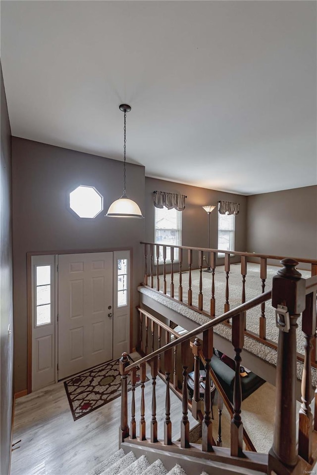 entryway with light hardwood / wood-style floors