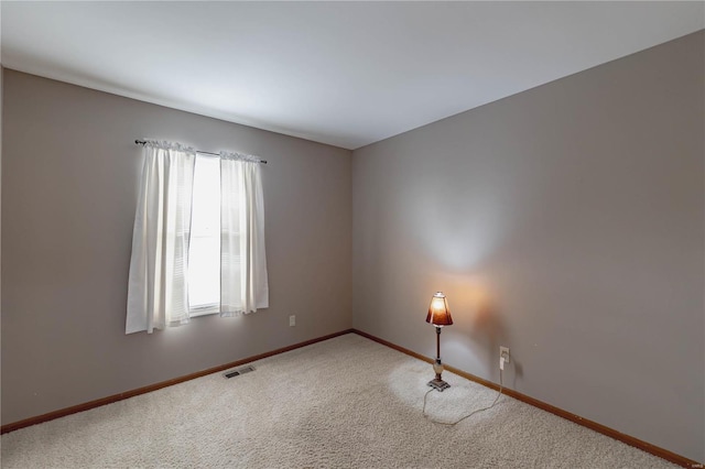 view of carpeted spare room