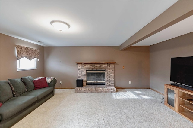 living room featuring beamed ceiling, light carpet, and a brick fireplace