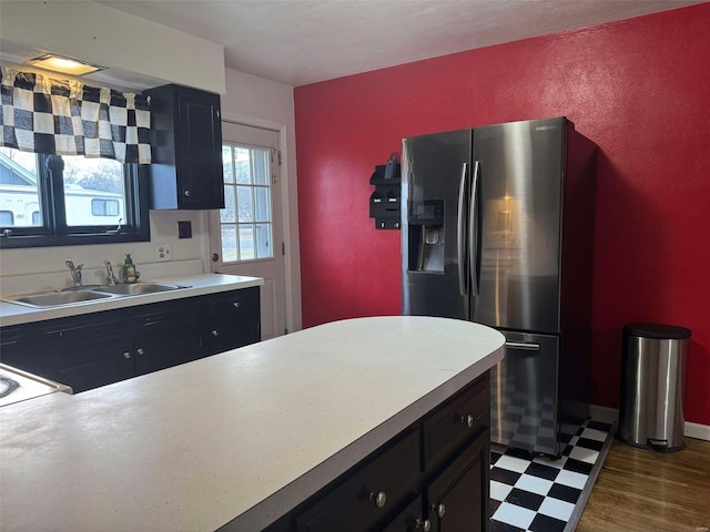 kitchen with sink and stainless steel fridge with ice dispenser