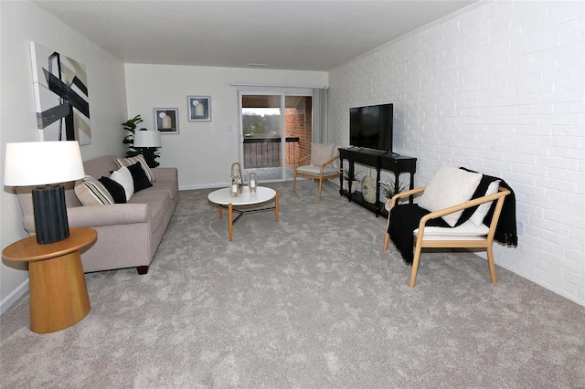 living room featuring light carpet and brick wall