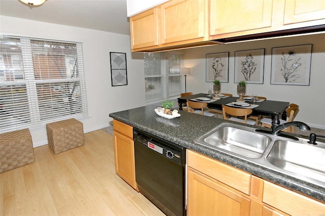 kitchen with black dishwasher, sink, light brown cabinetry, and light wood-type flooring