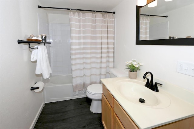 full bathroom featuring hardwood / wood-style flooring, vanity, shower / tub combo with curtain, and toilet