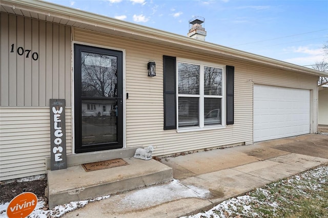 entrance to property with a garage