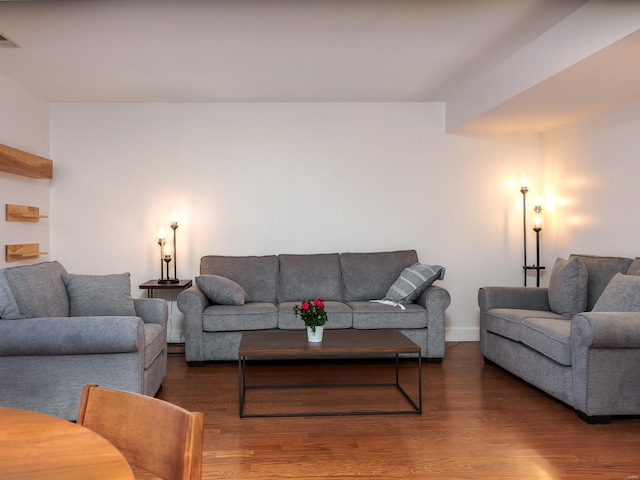 living room with dark wood-type flooring