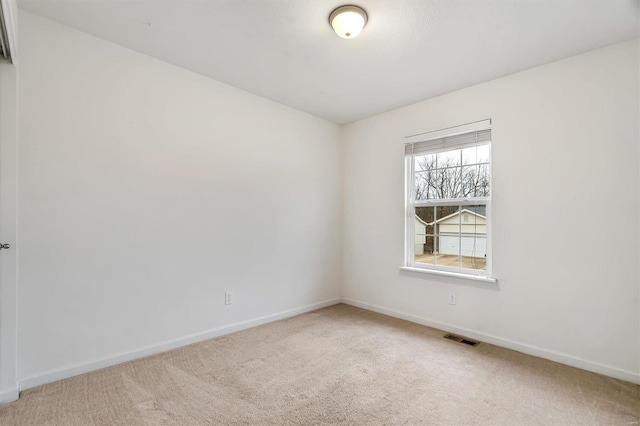 view of carpeted spare room