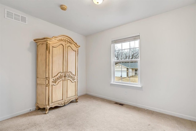 unfurnished bedroom with light carpet