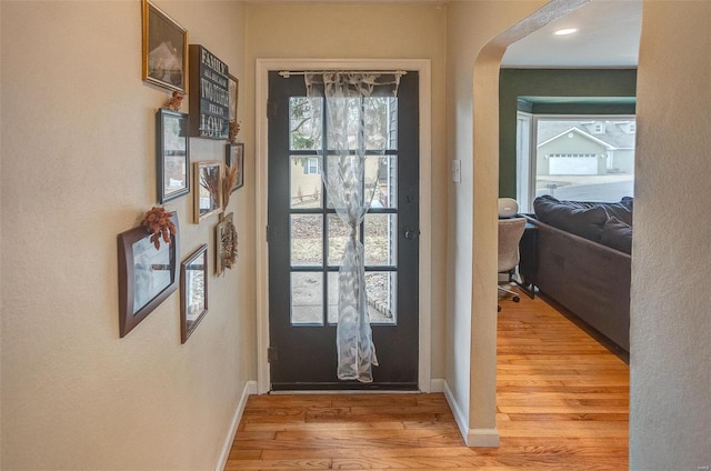 doorway featuring wood-type flooring