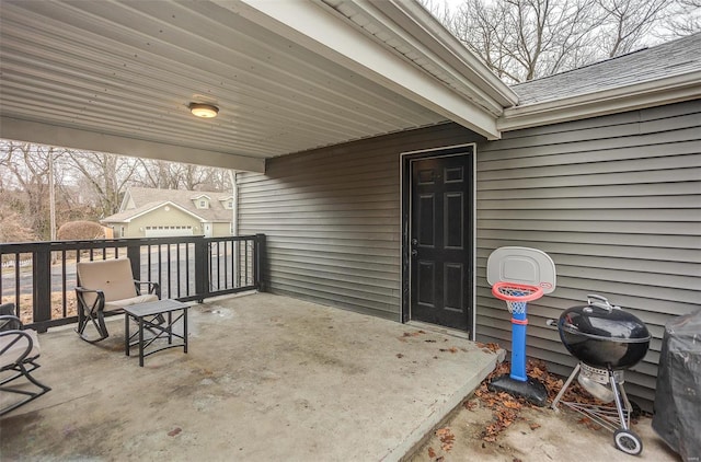 view of patio featuring a grill