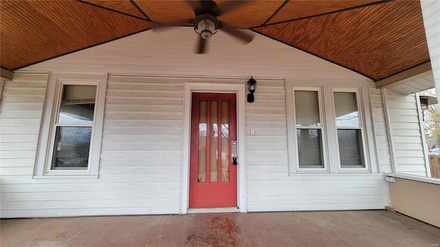 doorway to property featuring ceiling fan