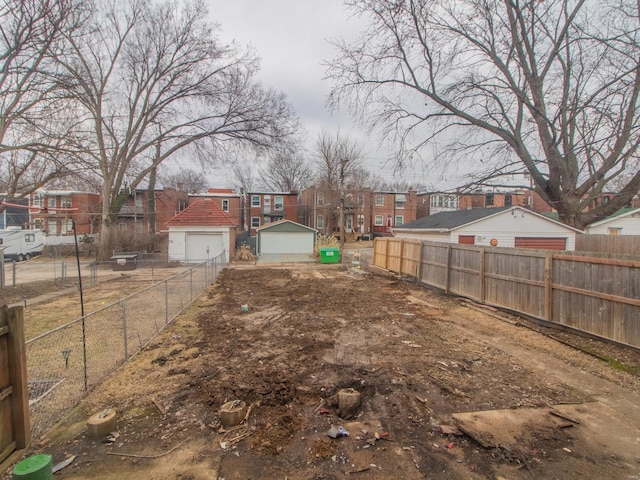 view of yard featuring a garage