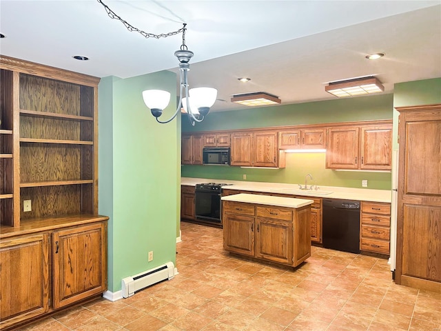 kitchen featuring a chandelier, a baseboard heating unit, a kitchen island, light countertops, and black appliances