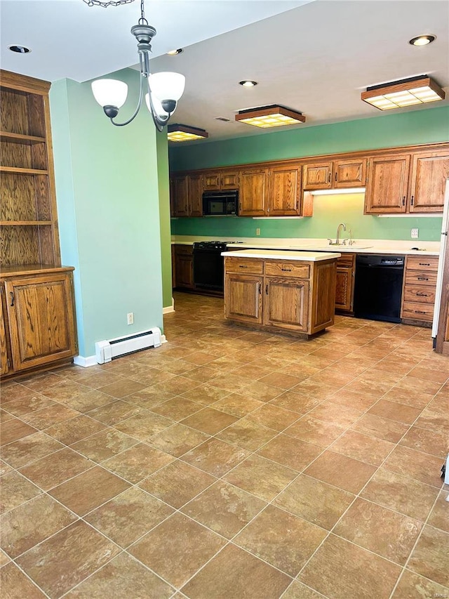 kitchen featuring a baseboard radiator, baseboards, light countertops, black appliances, and brown cabinetry