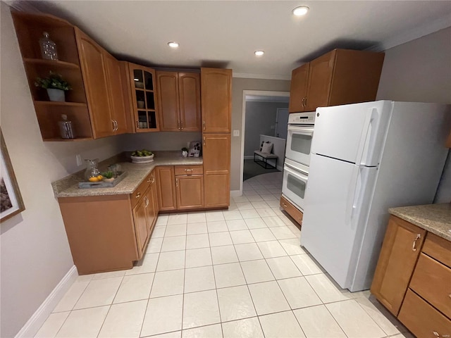 kitchen with light tile patterned floors and white appliances