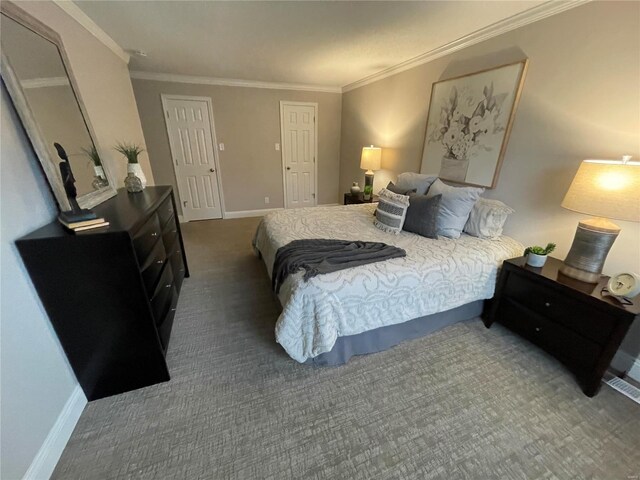 carpeted bedroom with crown molding