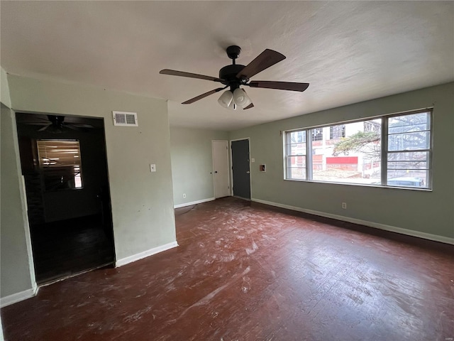 unfurnished room featuring ceiling fan