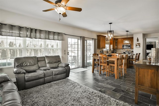 living room featuring ceiling fan