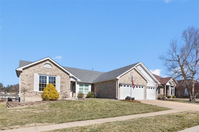 ranch-style house featuring a front yard, brick siding, concrete driveway, and an attached garage