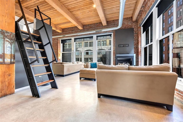 unfurnished living room with wooden ceiling, beamed ceiling, and brick wall