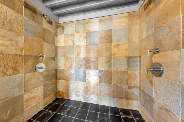 bathroom with tiled shower