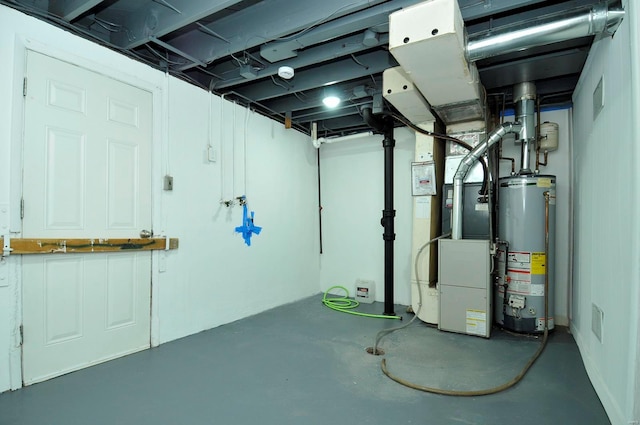 basement with heating unit and gas water heater