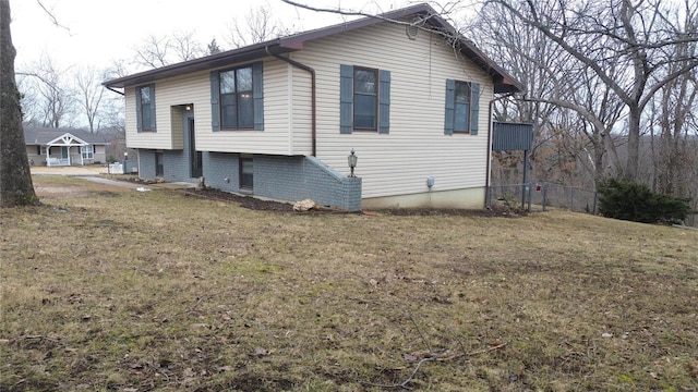 view of property exterior featuring a yard