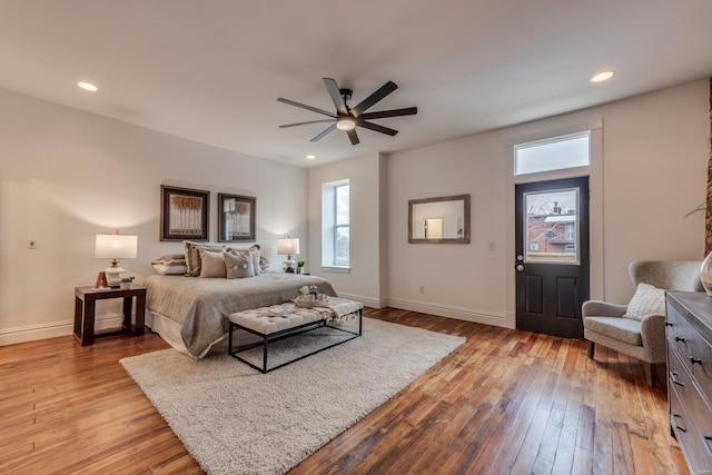 bedroom featuring ceiling fan and light wood-type flooring