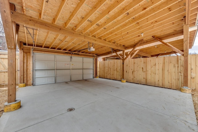 garage featuring a garage door opener