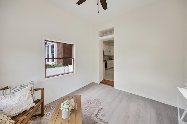 unfurnished room featuring ceiling fan and light wood-type flooring