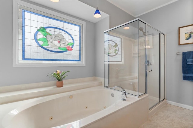 full bathroom with a stall shower, baseboards, a tub with jets, and tile patterned floors