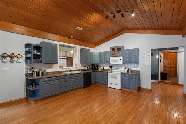 kitchen featuring sink, white appliances, gray cabinetry, hanging light fixtures, and decorative backsplash