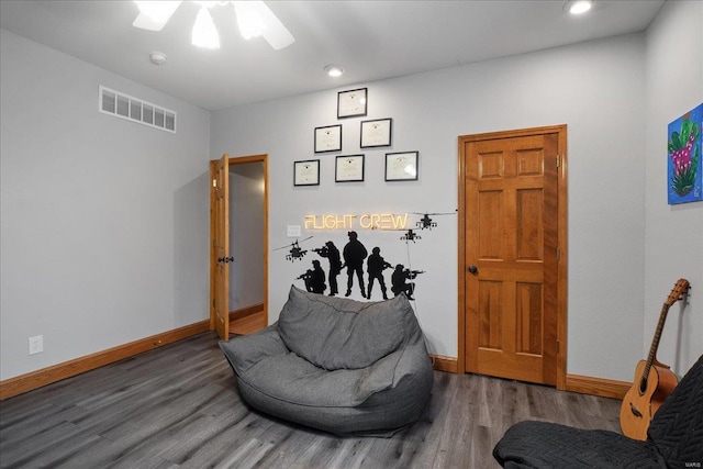 living area featuring dark hardwood / wood-style flooring