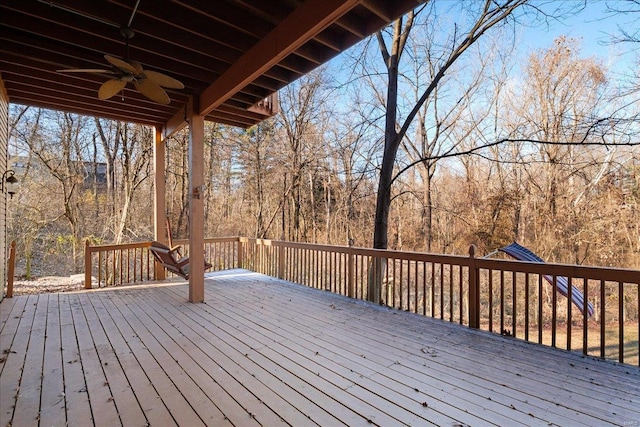 wooden deck featuring ceiling fan