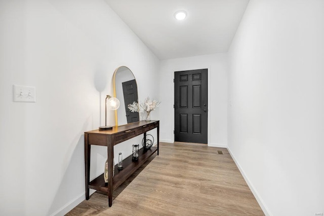 entrance foyer featuring hardwood / wood-style flooring