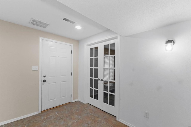 entryway with french doors