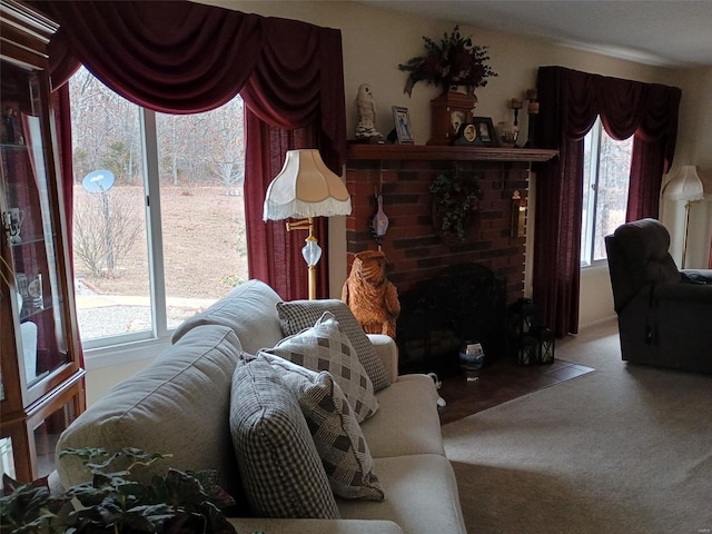 living room featuring a fireplace and carpet