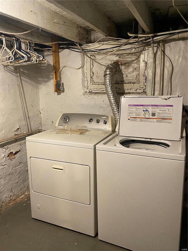 washroom featuring independent washer and dryer