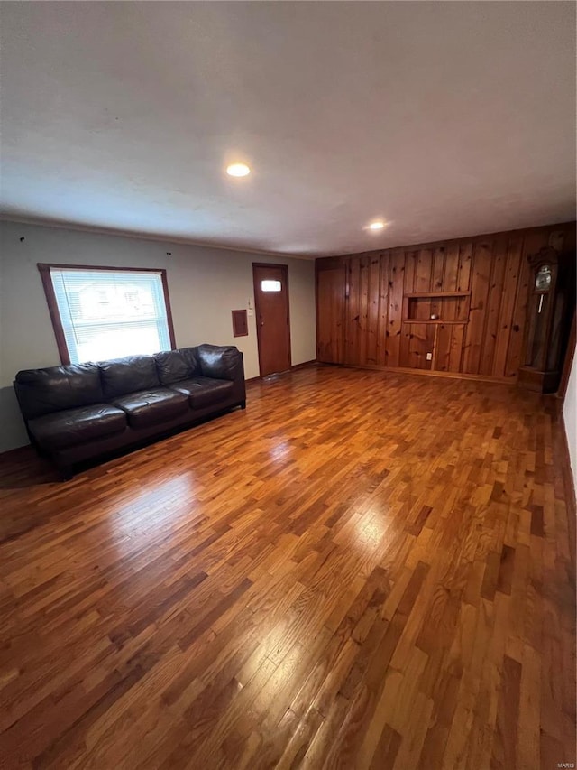 unfurnished living room with hardwood / wood-style flooring