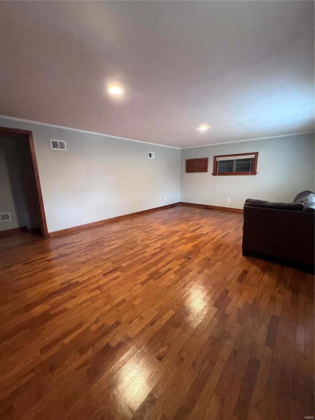 unfurnished living room with dark hardwood / wood-style flooring