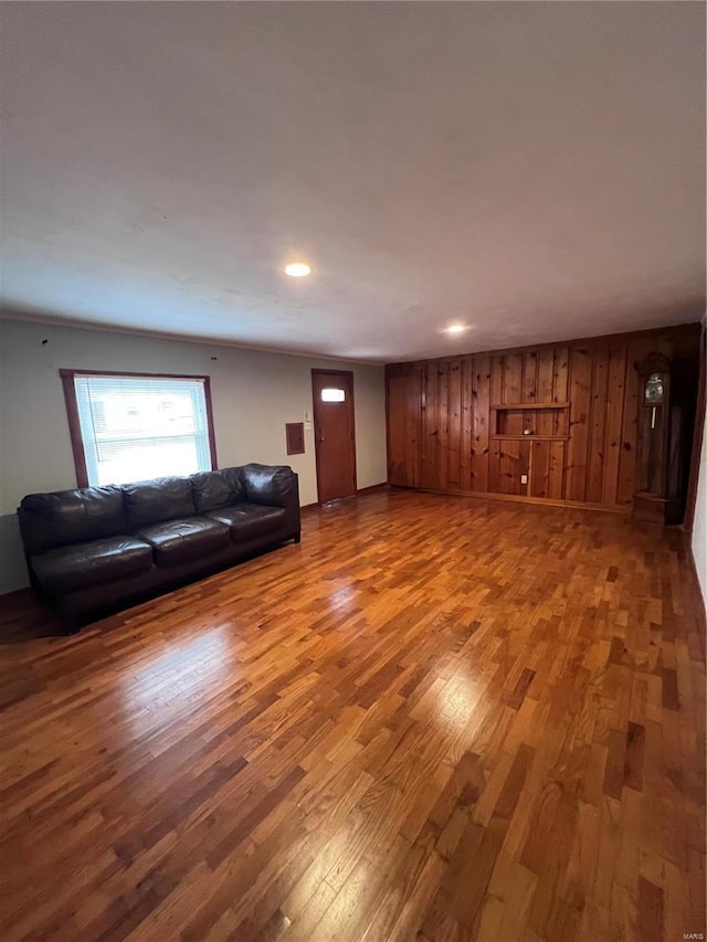 unfurnished living room featuring hardwood / wood-style flooring