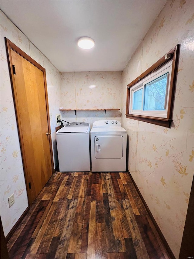 laundry area featuring dark hardwood / wood-style flooring and washer and dryer